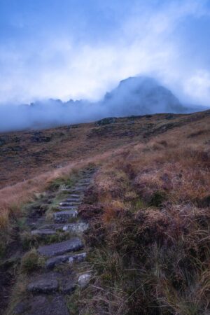 The stone stairs leading to the Stac Pollaidh yet lost in morning clouds. Highlands, Scotland, Autumn 2022 Stone stairs to the Stac Pollaidh, lost in morning clouds, landscape photography, Highlands, Scotland, Autumn 2022